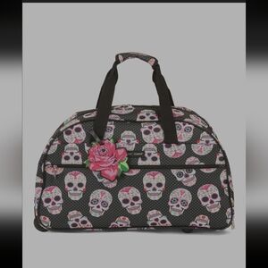 Betsey Johnson rolling duffle bag sugar skulls NWT